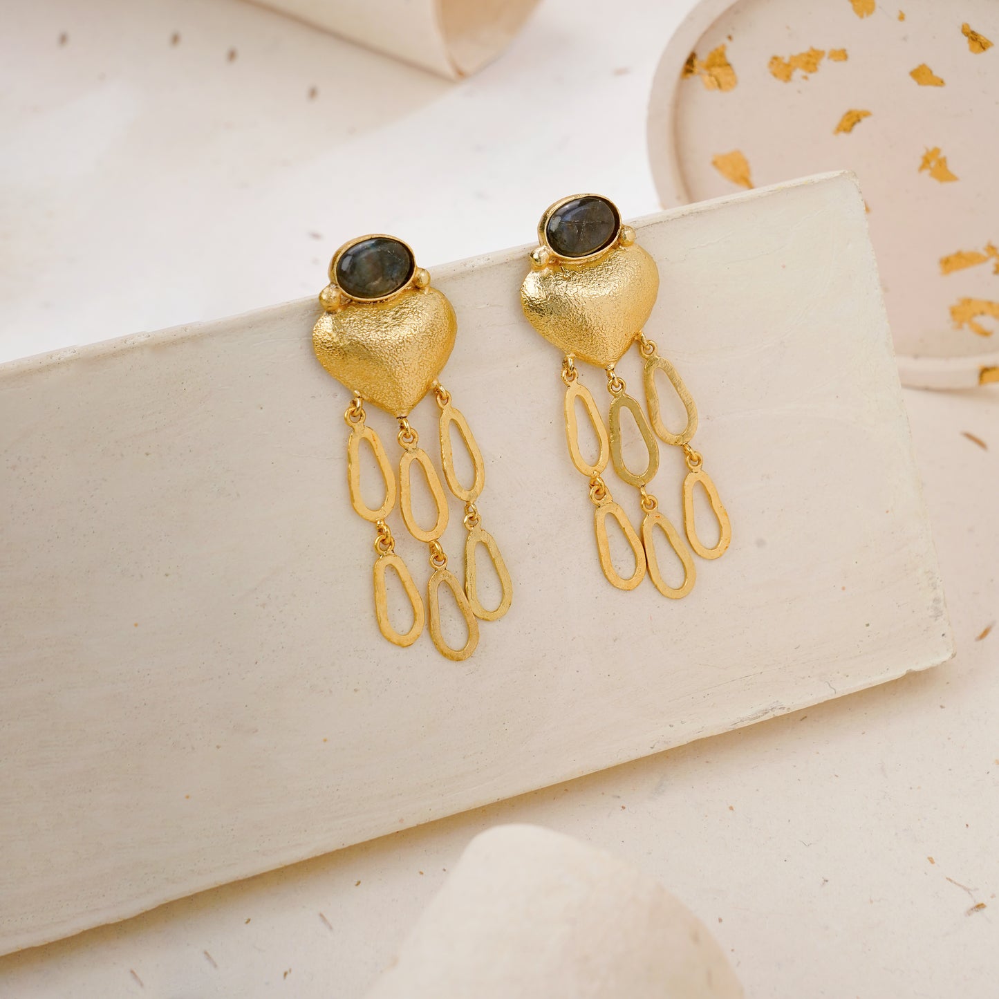 Gold heart statement earrings